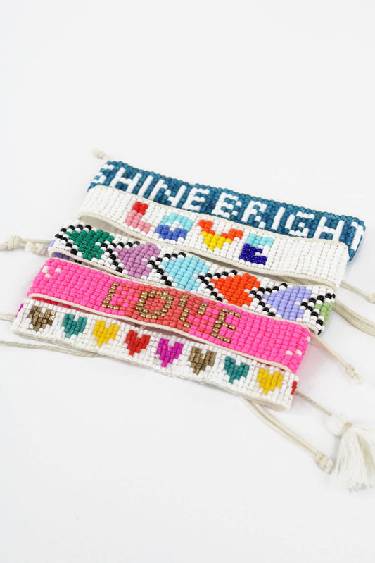 SET MIT 5 WEISSEN REGENBOGEN-ARMBÄNDERN